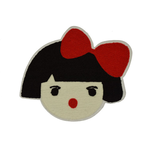 meisje met rode strik applicatie badstof 17 x 21 cm